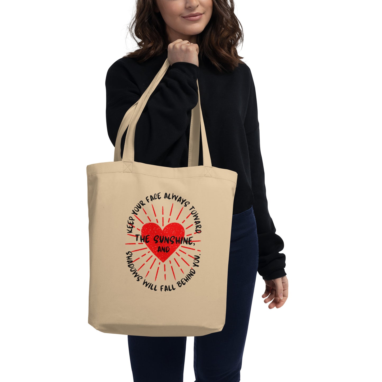 Keep your face always toward the sunshine, and shadows will fall behind you. Eco Tote Bag