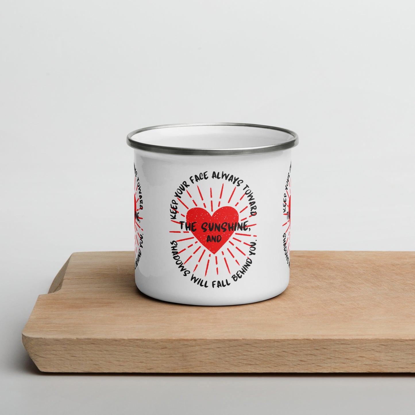 Keep your face always toward the sunshine, and shadows will fall behind you. Enamel Mug