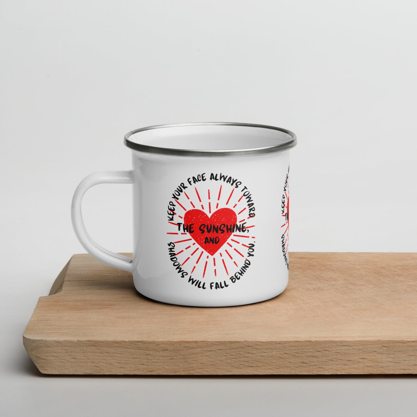 Keep your face always toward the sunshine, and shadows will fall behind you. Enamel Mug
