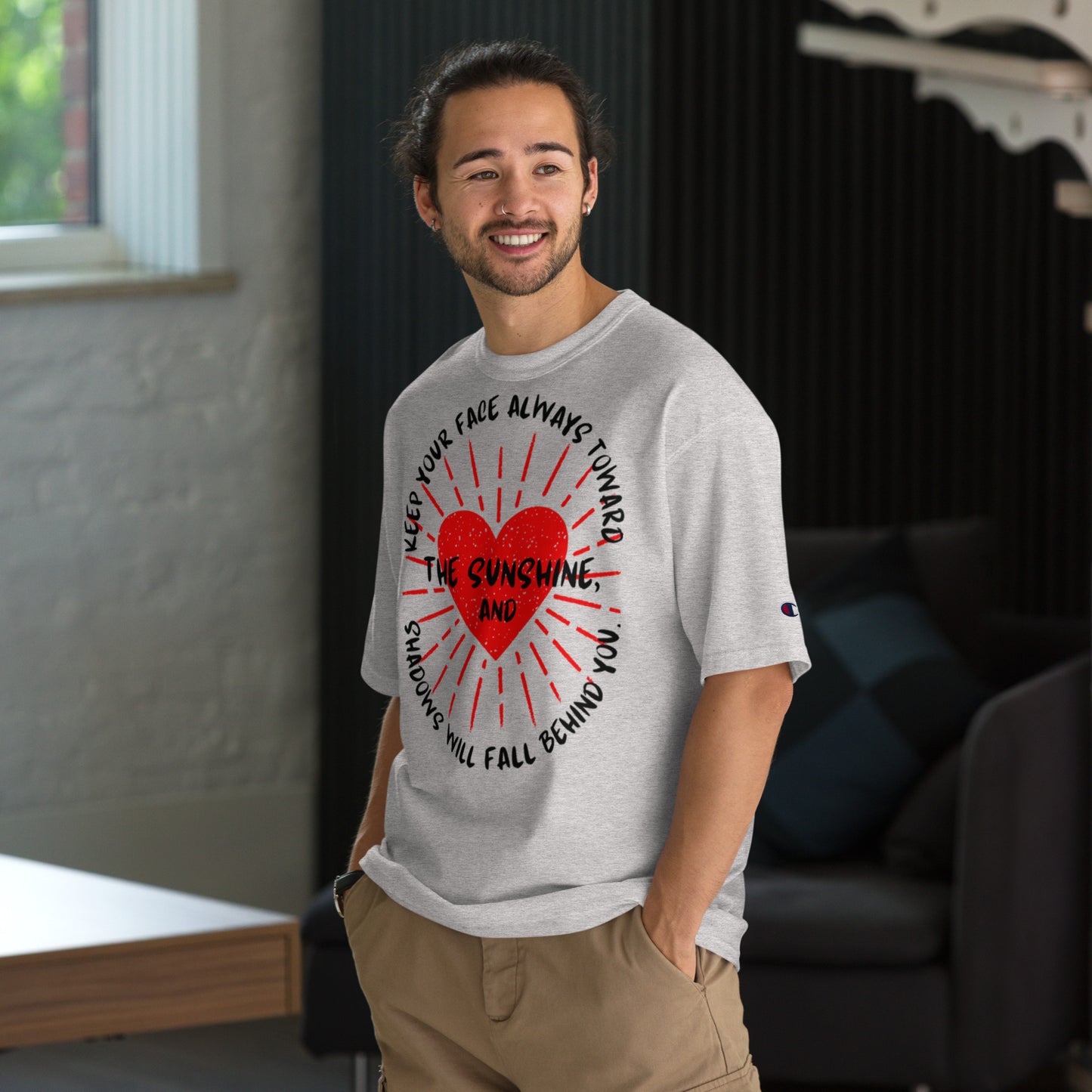 Keep your face always toward the sunshine, and shadows will fall behind you. Champion T-Shirt